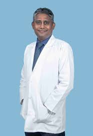 Dr. Muruganandham K